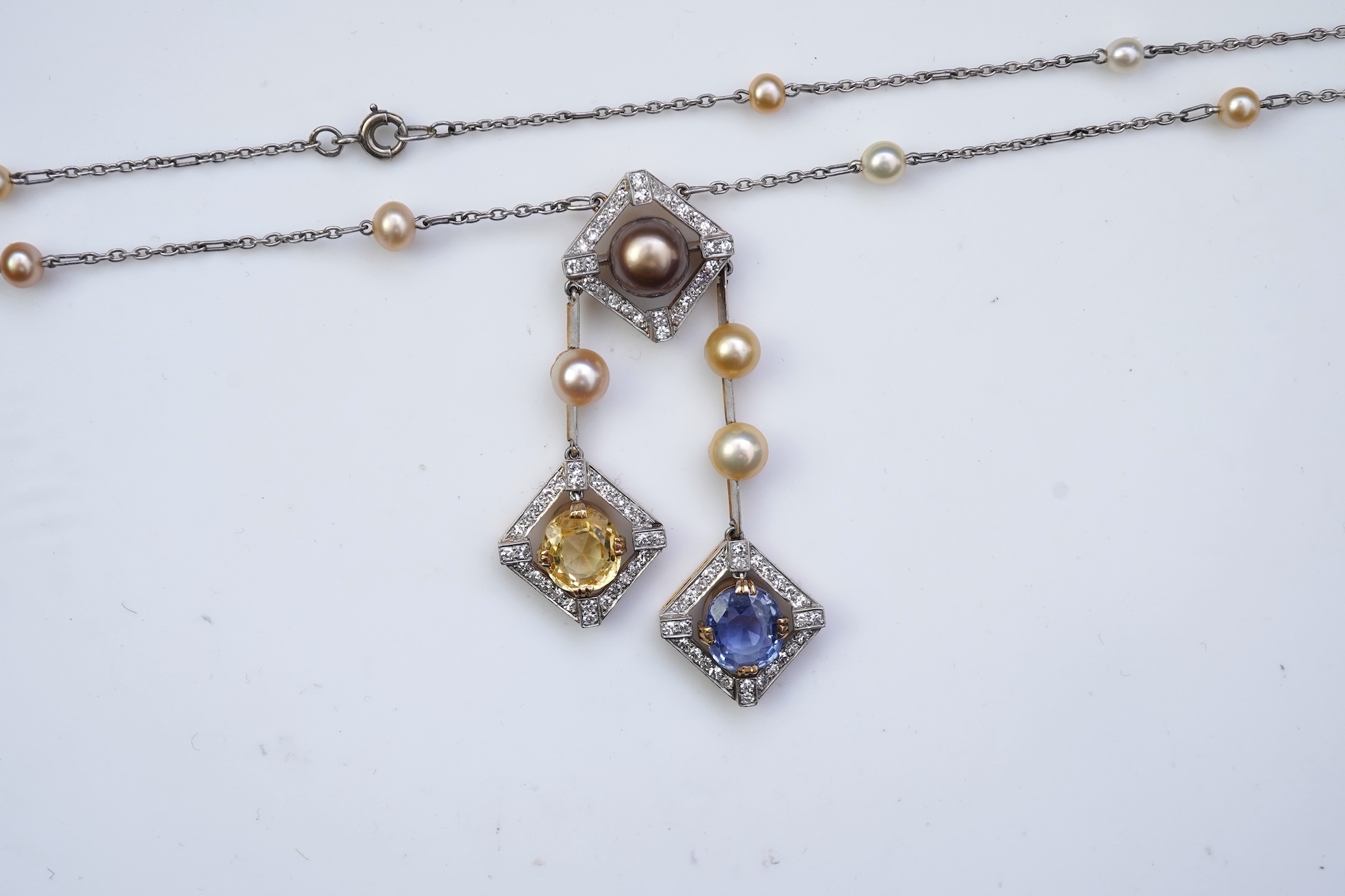 An Art Deco sapphire, natural pearl and diamond necklace, circa 1920